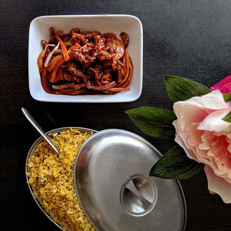Trung's Restaurant main course crispy shredded beef in tangy sweet cantonese sauce served with egg fried rice