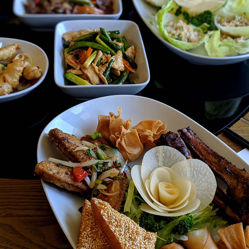 Trung's Restaurant sharing plates mixed starter and chicken asparagus and sugar snap peas